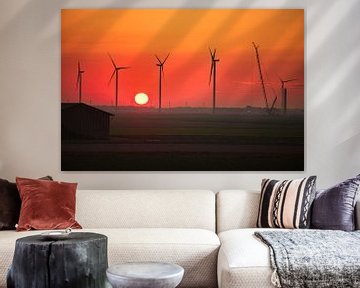 sunset near a wind farm under construction by PixelPower