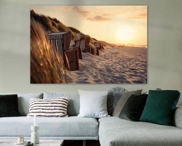 Beach chairs on the beach in the evening light by ARTemberaubend