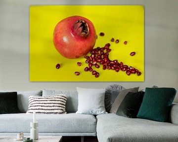 Pomegranate on lime background van Edith Keijzer