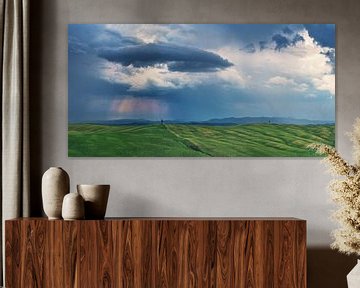 Italy Tuscany hilly landscape with thunderstorm by Jean Claude Castor