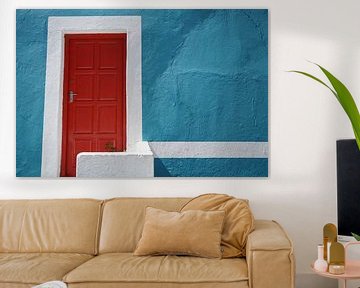 Red door in blue wall in colourful Bo-Kaap,Cape Town