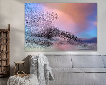 Starling murmuration in the sky during sunset by Sjoerd van der Wal Photography