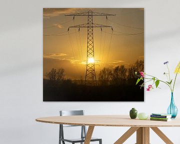 Silhouette of an electricity mast at sunset by Rob Baken