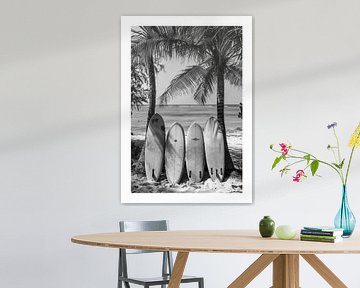 Surfboards on a palm beach in monochrome by Felix Brönnimann