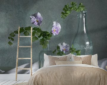 Still life, antique bottles with pansies and lapwing eggs by Oda Slofstra