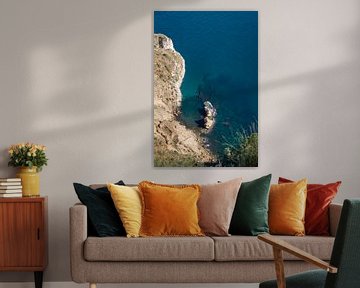 Cliffs and turquoise blue sea water by Adriana Mueller