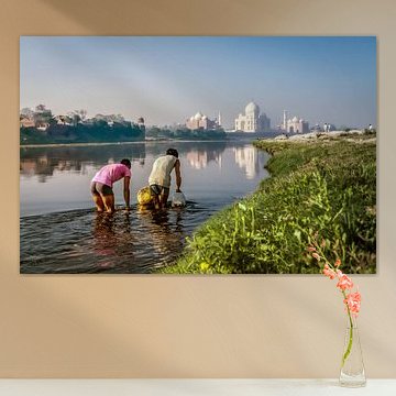 Two water carriers in the Yamuna river near the Taj Mahal in Agra India. Wout Kok One2expose
