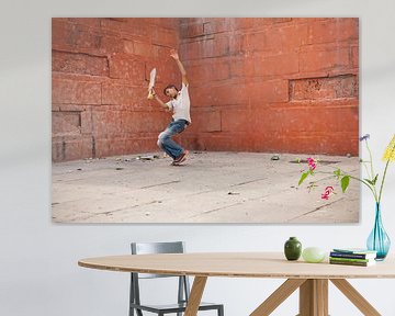 Boy playing cricket in Varanasi India. Wout Kok One2expose by Wout Kok