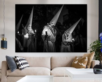 Three members of a fraternity in procession during semana santa in Seville. Wout Kok One2expose by Wout Kok