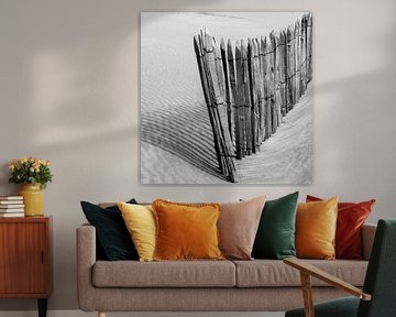 Wooden fence on beach near Katwijk. by Alie Ekkelenkamp
