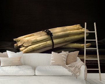 Still life with bundle of asparagus on antique table. Wout Kok One2expose by Wout Kok