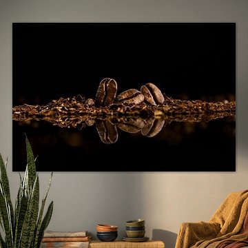 Drei Kaffeebohnen in einer Reihe