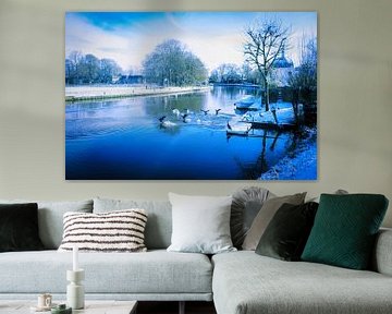 Blauw wit landschap met aalscholvers na sneeuwval in Maarssen-Dorp van Jos van den berg