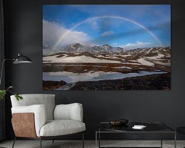 Rainbow over the mountains in Iceland by Lisa Groothuis