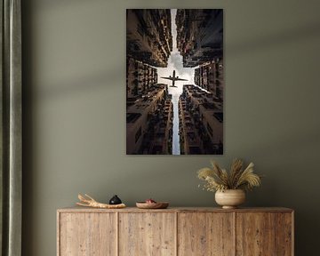 Aeroplane over the cityscape by Poster Art Shop