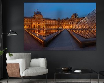 Louvre Museum reflected in the water by Markus Lange