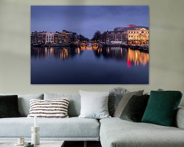 Zicht over de rivier de Amstel in Amsterdam van Dick Portegies