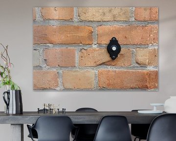 Bouton de sonnette sur un mur de maison