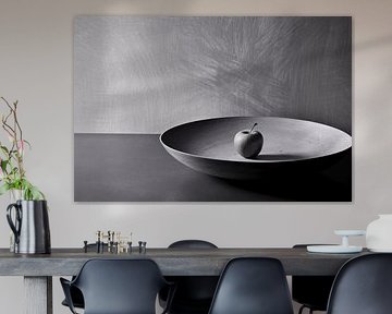 Black-and-white photo of apple in bowl