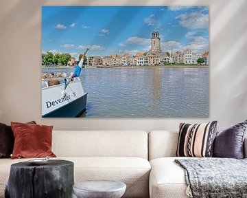 Zicht op Deventer en pontje op de IJssel van Henk van Blijderveen