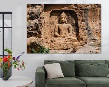 Meditative Buddha Sculpture in Rock Wall