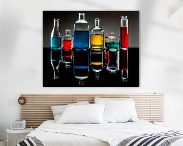 six bottles of coloured liquids