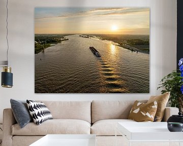 Aerial view of shipping on the river Merwede near Gorinchem in the Netherlands at sunset by Eye on You