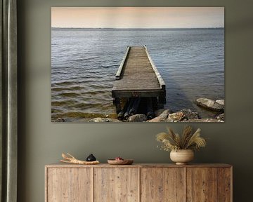 Wooden jetty in lake by Yvonne Smits
