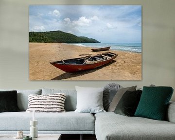 Fishing boats on a lonely Caribbean beach by Bettina Schnittert