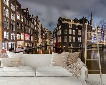 Aan de mooi verlichte Amsterdamse grachten!