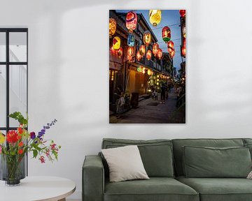 Street with lanterns at night in Taiwan by Mickéle Godderis