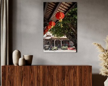 Lampion with a temple and tree in the background by Mickéle Godderis