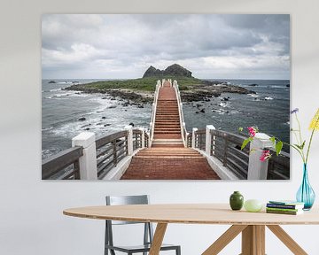 Stairs and bridge to a seaside island in Taiwan by Mickéle Godderis