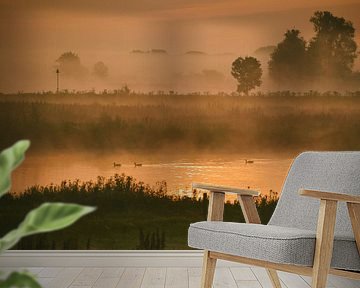 Gouden zonsopkomst aan de IJssel van Jisca Lucia