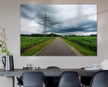Thunderclouds and electricity pole