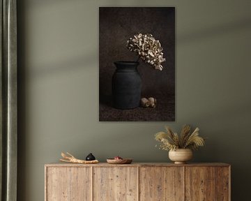 Still life with a dried hydrangea in a vase