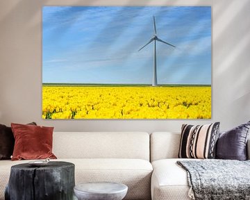 Wind turbine on a levee behind yellow tulips by Sjoerd van der Wal Photography