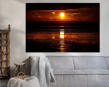 ondergaande zon aan het strand van Egon Zitter