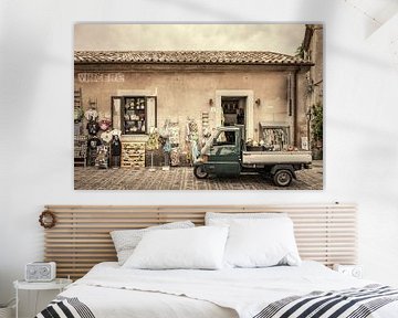 Savoca in Sicily, shop with Piaggio Ape pick-up. by Ron van der Stappen