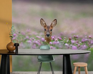 Goat among flowers by Irmo Bos