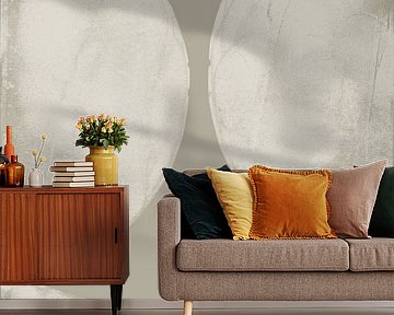Abstract shapes in white on light taupe.