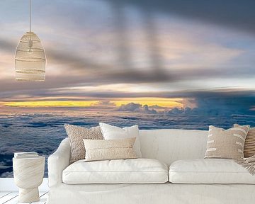 Zonsondergang boven de wolken