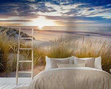 Zonsondergang boven het strand van Ameland. van Karel Pops