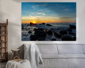 Wundervoller Sonnenuntergang am Strand der Ostsee auf Rügen mit Steinlandschaft am Kap Arkona von Animaflora PicsStock