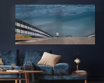 Bridge over A7 near Wons in Friesland with walking man and car by Harrie Muis