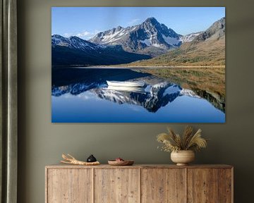 Quiet mountain lake with boat by Art & Soul Creations