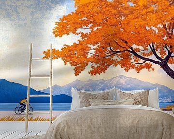 Radfahrer unter Herbstbaum mit Bergblick