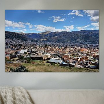 The town of Huaraz, nestled between the Andes peaks of Peru
