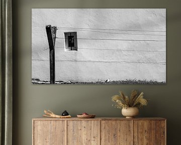 Washing line in front of a white façade by Flatfield