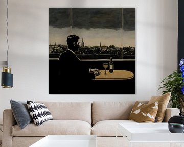 Solitary man sits at a table